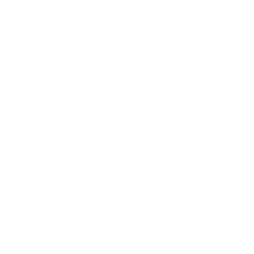 Fluffy gray cat lounging on a white sofa