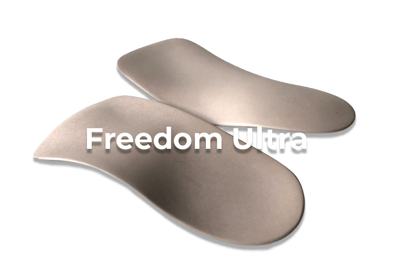 Freedom Ultra shoe insoles isolated on black background